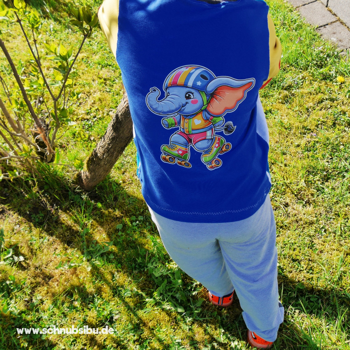 Bügelbild Elefant auf Rollschuhen